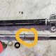 Without bushing (red circle) the only force holding the rack center is pressure between the steering shaft and pressure spring pushing on the back of the rack.